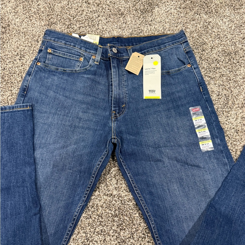 Levi's Blue 502 Taper Stretch Jeans with Tan Patch